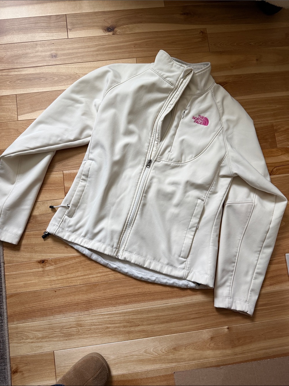 The North Face Cream Softshell Jacket with Pink Logo